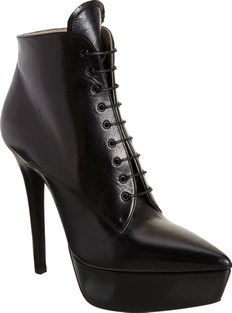 prada black leather pointed toe boots|Prada snakeskin boots.